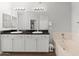 Modern bathroom features a double vanity and a large soaking tub for relaxation at 20121 N 76Th St # 2058, Scottsdale, AZ 85255