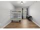 Bedroom features a bunk bed, wood floors, and window with shades at 20121 N 76Th St # 2058, Scottsdale, AZ 85255