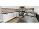Beautiful kitchen featuring white cabinets, stainless appliances and dark counters at 20121 N 76Th St # 2058, Scottsdale, AZ 85255