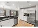 Stylish kitchen featuring stainless steel appliances, and white cabinets at 20121 N 76Th St # 2058, Scottsdale, AZ 85255