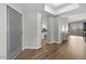 Open-concept living area with hardwood floors and plenty of natural light at 20121 N 76Th St # 2058, Scottsdale, AZ 85255