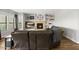 Comfortable living room with a fireplace, built-in shelves, and large windows providing natural light at 20121 N 76Th St # 2058, Scottsdale, AZ 85255