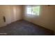 Bedroom featuring a spacious closet and a bright window at 2020 W Union Hills Dr # 240, Phoenix, AZ 85027