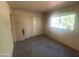 Bedroom with a closet and a window that provides plenty of natural light at 2020 W Union Hills Dr # 240, Phoenix, AZ 85027