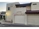 Attached garages showcasing the building's architecture and well-maintained exterior at 2020 W Union Hills Dr # 240, Phoenix, AZ 85027