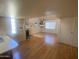 Bright open living area with hardwood floors, fireplace and lots of natural light at 2020 W Union Hills Dr # 240, Phoenix, AZ 85027