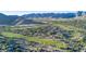 Aerial view of a golf course community with luxury homes and manicured landscaping at 20603 W Alsap Rd, Buckeye, AZ 85396