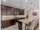 Gourmet kitchen featuring granite countertops, stainless steel appliances, and pendant lighting at 20603 W Alsap Rd, Buckeye, AZ 85396