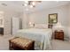 Inviting main bedroom boasts natural light, floral bedding, and coordinated nightstands at 20603 W Alsap Rd, Buckeye, AZ 85396