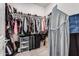 Spacious walk-in closet with ample storage, shelving, and organizational systems at 21824 S 226Th Pl, Queen Creek, AZ 85142