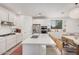 Bright kitchen featuring a large island, stainless steel appliances, and modern finishes at 21824 S 226Th Pl, Queen Creek, AZ 85142