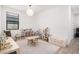 Large playroom with neutral walls, plush carpet, and a variety of toys at 21824 S 226Th Pl, Queen Creek, AZ 85142