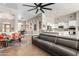 Expansive living area featuring open layout, modern furnishings, and seamless flow to kitchen at 2308 E Dry Wood Rd, Phoenix, AZ 85024