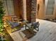 Outdoor patio area with stone columns and comfortable seating, perfect for relaxing and entertaining at 2308 E Dry Wood Rd, Phoenix, AZ 85024