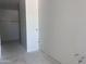 Spacious walk-in closet with built-in shelving for organized storage solutions at 24104 W Bowker St, Buckeye, AZ 85326