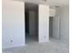 Hallway with freshly painted walls and ample space for customization and decor at 24104 W Bowker St, Buckeye, AZ 85326