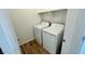 Functional laundry room features a washer and dryer hookup, offering convenience in a compact space at 25133 W Wayland Dr, Buckeye, AZ 85326