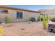 Spacious backyard showcasing mature trees and desert landscaping at 26330 N 56Th Dr, Phoenix, AZ 85083