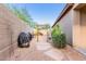 Private backyard with stone walkway and potential for landscaping at 26330 N 56Th Dr, Phoenix, AZ 85083