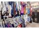 Walk-in closet with multiple hanging rods and shelving at 26330 N 56Th Dr, Phoenix, AZ 85083