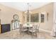 Cozy dining room offers a round table and comfortable seating at 26330 N 56Th Dr, Phoenix, AZ 85083