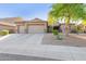Charming single-story home with a three-car garage and desert landscaping at 26330 N 56Th Dr, Phoenix, AZ 85083