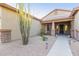 Inviting front porch with a decorative cacti and stone accents at 26330 N 56Th Dr, Phoenix, AZ 85083