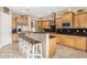 Updated kitchen with granite countertops and stainless steel appliances at 26330 N 56Th Dr, Phoenix, AZ 85083