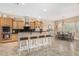 Well-equipped kitchen features stainless steel appliances, granite countertops, and custom wood cabinets at 26330 N 56Th Dr, Phoenix, AZ 85083