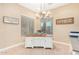 Home office with natural light, a decorative chandelier, and a desk with storage at 26330 N 56Th Dr, Phoenix, AZ 85083