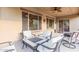 Comfortable outdoor seating area with a fireplace provides a relaxing spot for gatherings at 26330 N 56Th Dr, Phoenix, AZ 85083