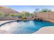Backyard pool featuring mountain views, beautiful landscaping, and a built in waterfall feature at 26330 N 56Th Dr, Phoenix, AZ 85083