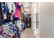 Organized walk-in closet with ample storage space and visible safe at 26330 N 56Th Dr, Phoenix, AZ 85083