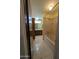 Tiled bathroom with neutral tile and dark wood vanity and sink at 2934 W Northview Ave, Phoenix, AZ 85051
