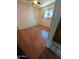 Bedroom with wood laminate floors, a window with blinds, and a ceiling fan at 2934 W Northview Ave, Phoenix, AZ 85051