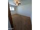 Bedroom with neutral carpet, a window with blinds, and a ceiling fan at 2934 W Northview Ave, Phoenix, AZ 85051