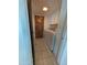 A view of the laundry room, with washer, dryer and overhead cabinets at 2934 W Northview Ave, Phoenix, AZ 85051