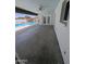 Covered patio with concrete floor and views of the fenced pool area at 2934 W Northview Ave, Phoenix, AZ 85051
