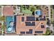 Aerial view of the home with a private pool, putting green, and solar panels at 2985 N Point Ridge Rd, Buckeye, AZ 85396