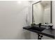 Modern bathroom with a vessel sink, contemporary fixtures, and a sleek design at 2985 N Point Ridge Rd, Buckeye, AZ 85396