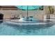 In-pool lounge chairs offer a refreshing way to enjoy the gorgeous swimming pool on a sunny day at 2985 N Point Ridge Rd, Buckeye, AZ 85396