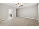 The spacious main bedroom includes a ceiling fan, and direct access to the bathroom at 30776 W Earll Dr, Buckeye, AZ 85396
