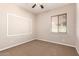 Cozy bedroom with carpet flooring and natural light, offering a bright canvas for personalization and comfortable living at 3819 N Springfield St, Buckeye, AZ 85396