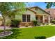 Charming single-Gathering home showcasing a lovely front lawn and inviting curb appeal at 3819 N Springfield St, Buckeye, AZ 85396