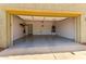 Spacious garage with epoxy flooring, ample storage, and a clean, organized layout at 3819 N Springfield St, Buckeye, AZ 85396