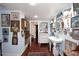 Bathroom featuring a sink, an assortment of vintage artwork, and a doorway leading to another room at 4317 N 70Th St, Scottsdale, AZ 85251