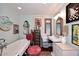 Quaint bathroom boasts a clawfoot tub and vintage-style sink, creating a relaxing atmosphere at 4317 N 70Th St, Scottsdale, AZ 85251