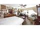 Large bedroom filled with ornate decor, furniture, paintings and natural light from the windows at 4317 N 70Th St, Scottsdale, AZ 85251