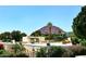 Scenic exterior view highlighting the property's mountain backdrop, lush greenery, and modern architecture at 4317 N 70Th St, Scottsdale, AZ 85251