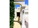 Charming front entrance featuring textured columns, arched entryways, and tiled walkway at 4317 N 70Th St, Scottsdale, AZ 85251